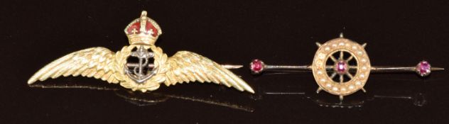 A 9ct gold Royal Navy sweetheart brooch (4.5g) and a yellow metal brooch set with rubies and seed