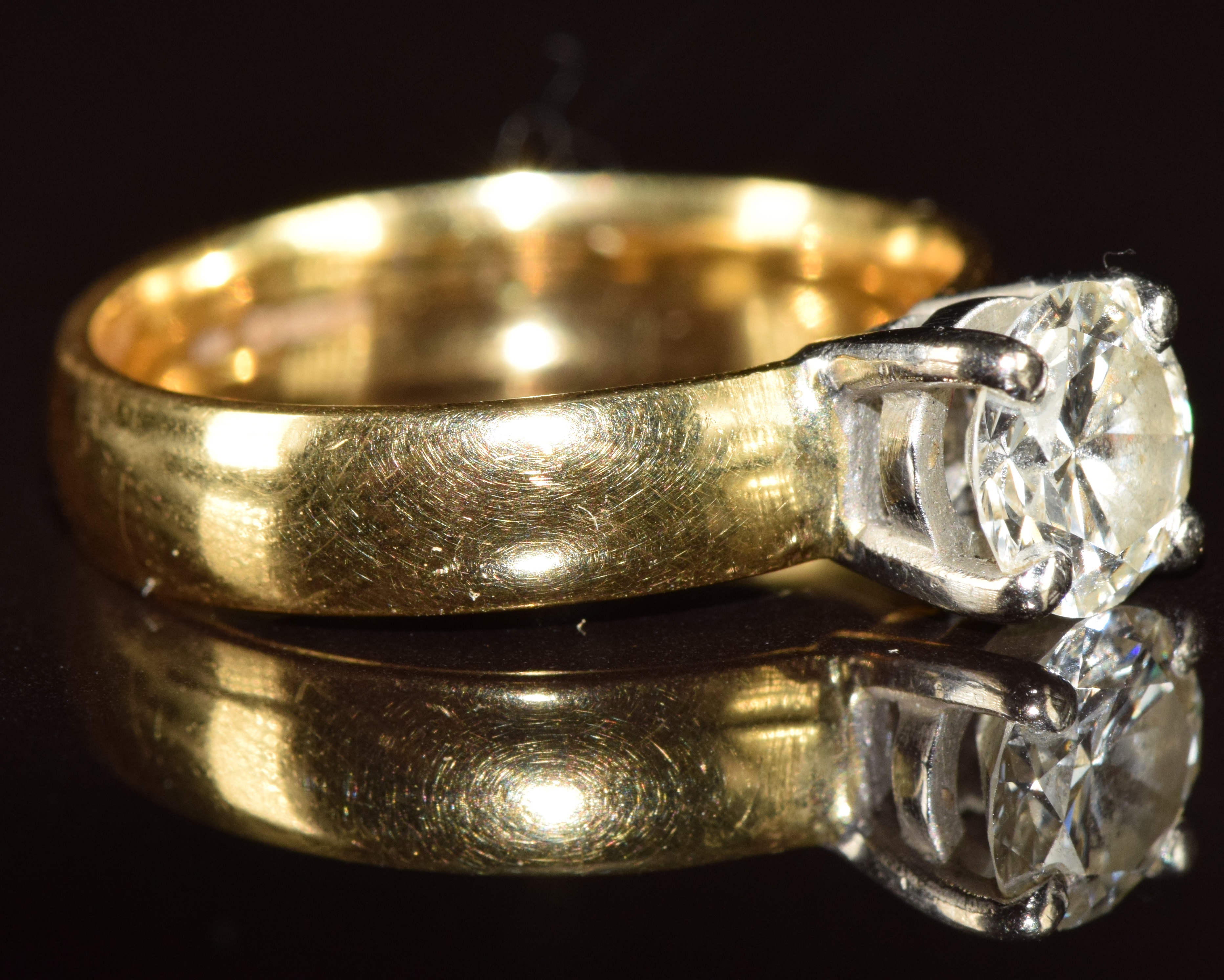 An 18ct gold ring set with a round brilliant cut diamond of approximately 0.9ct, 4.4g, size K - Image 2 of 3