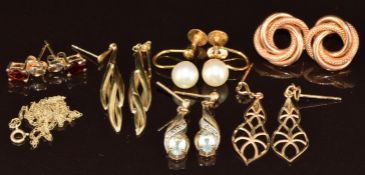 Six pairs of 9ct gold earrings including garnets, topaz, pearls, knots, etc, 8.1g
