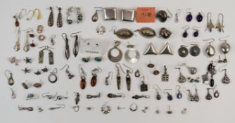 Forty pairs of silver earrings including pressed amber, amethyst, etc, 160g