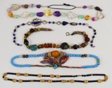 Five beaded necklaces including silver and lapis lazuli, glass with Navajo pendant, quartz necklace,