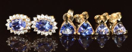 Three pairs of 9k gold earrings, two pairs set with trilliant cut tanzanites and the other pair with