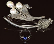A silver brooch/ pendant set with freshwater pearls and marcasite, a silver brooch set with