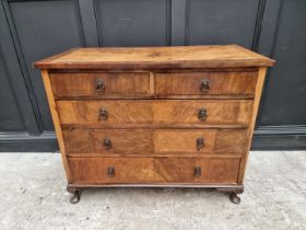 A 1930s walnut chest of drawers, 106.5cm wide.