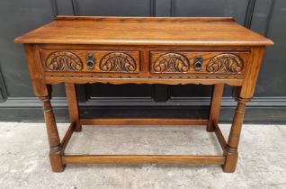 An 'Old Charm' oak two drawer side table, 106.5cm wide.