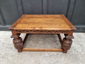 A good reproduction oak low occasional table, 97.5cm wide.