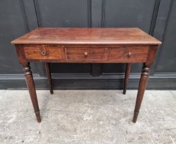 A Victorian mahogany side table, with a pair of frieze drawers flanking a dummy drawer, 90.5cm wide.