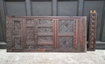 A carved oak panel, 17th century and later, 186.5 x 85cm, (made up).