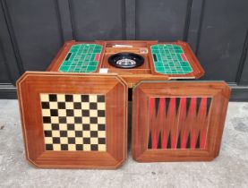 An Italian marquetry games table, incorporating a roulette wheel, backgammon and chequerboard,