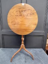 A George III mahogany circular tilt-top tripod wine table, 50cm diameter, (repairs to two legs).