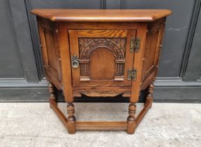 An 'Old Charm' oak credance cupboard, 81cm wide.