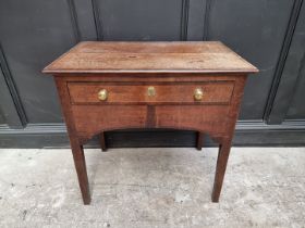 An unusual early 19th century oak and mahogany single drawer side table, 77.5cm wide.