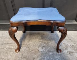 A 1930s walnut stool, in the 18th century style, 60cm wide.