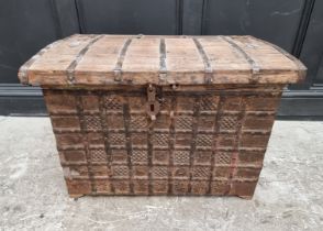 An Indian hardwood and metal bound trunk, with shallow domed top, 77cm wide.