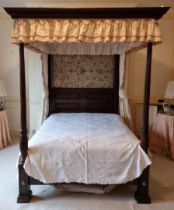 An antique mahogany 'Four Poster' double bed, with divan base, (no mattress).