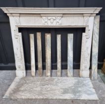 A large and impressive antique carved and painted pine fire surround, with marble inserts, 146