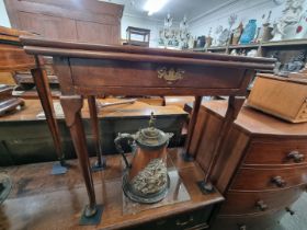 A small antique mahogany tea table, with single gateleg, 71cm wide.