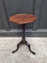 A small antique mahogany octagonal tripod wine table, with cluster column, 29.5cm wide.