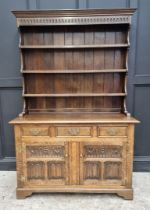 A good carved reproduction oak dresser & rack, attributed to Frank Pratt of Derby, 130.5cm wide.