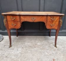 A Louis XV style mahogany bureau plat, with gilt brass mounts,113.5cm wide.