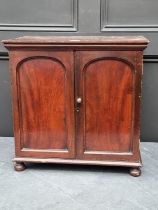 A small antique mahogany cabinet, 47.5 high x 48cm wide.