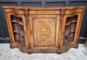 A Victorian walnut and marquetry serpentine fronted credenza, with gilt metal mounts, 190cm wide.