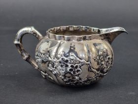 WITHDRAWN FROM SALE A Chinese export milk jug, by Luen Wo, Shanghai, 6cm high, 158g.