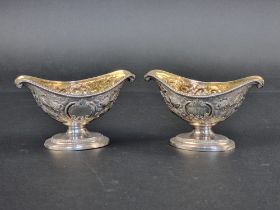 A pair of George III silver pedestal salts, by Daniel Smith & Robert Sharp, London 1785, with gilt