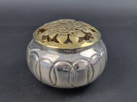 A silver potpourri box and pierced gilt cover, by S J Rose & Son, Birmingham 1991, 12cm diameter,