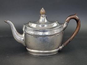 A George III Irish silver teapot, by Gustavus Byrne, Dublin 1801, 21cm high, gross weight 638g.