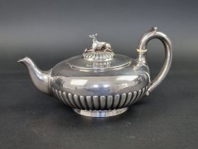 A William IV silver teapot, by Robert Garrard II, London 1836, 13.5cm high, gross weight 752g, (with