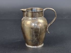 A William IV silver milk jug, London 1834, 10cm high, 191g.