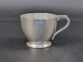 A silver Christening mug, by Mappin & Webb, Birmingham 1924, 6cm high, 157g.