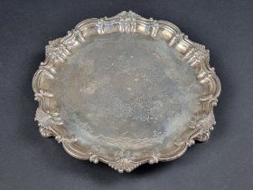 A late Victorian silver piecrust card tray, by Thomas Bradbury & Sons, London 1901, 21.5cm diameter,