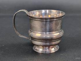 A George III silver mug, by Henry Nutting or Hannah Northcote, London 1778, 7cm high, 111g.