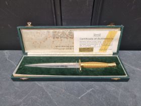 A cased Wilkinson Sword limited edition Commando knife, with etched blade, with CoA numbered 152/