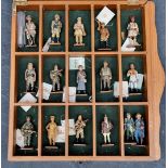 Sixteen various Del Prado military figures, in a glazed display case.