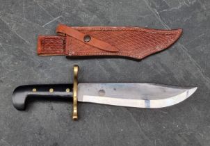 A Case XX USA Bowie knife and sheath, having 24cm blade.