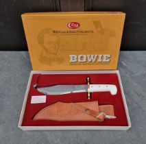 A Case XX presentation 'CA2000' Bowie knife and sheath, having 24cm blade, boxed.