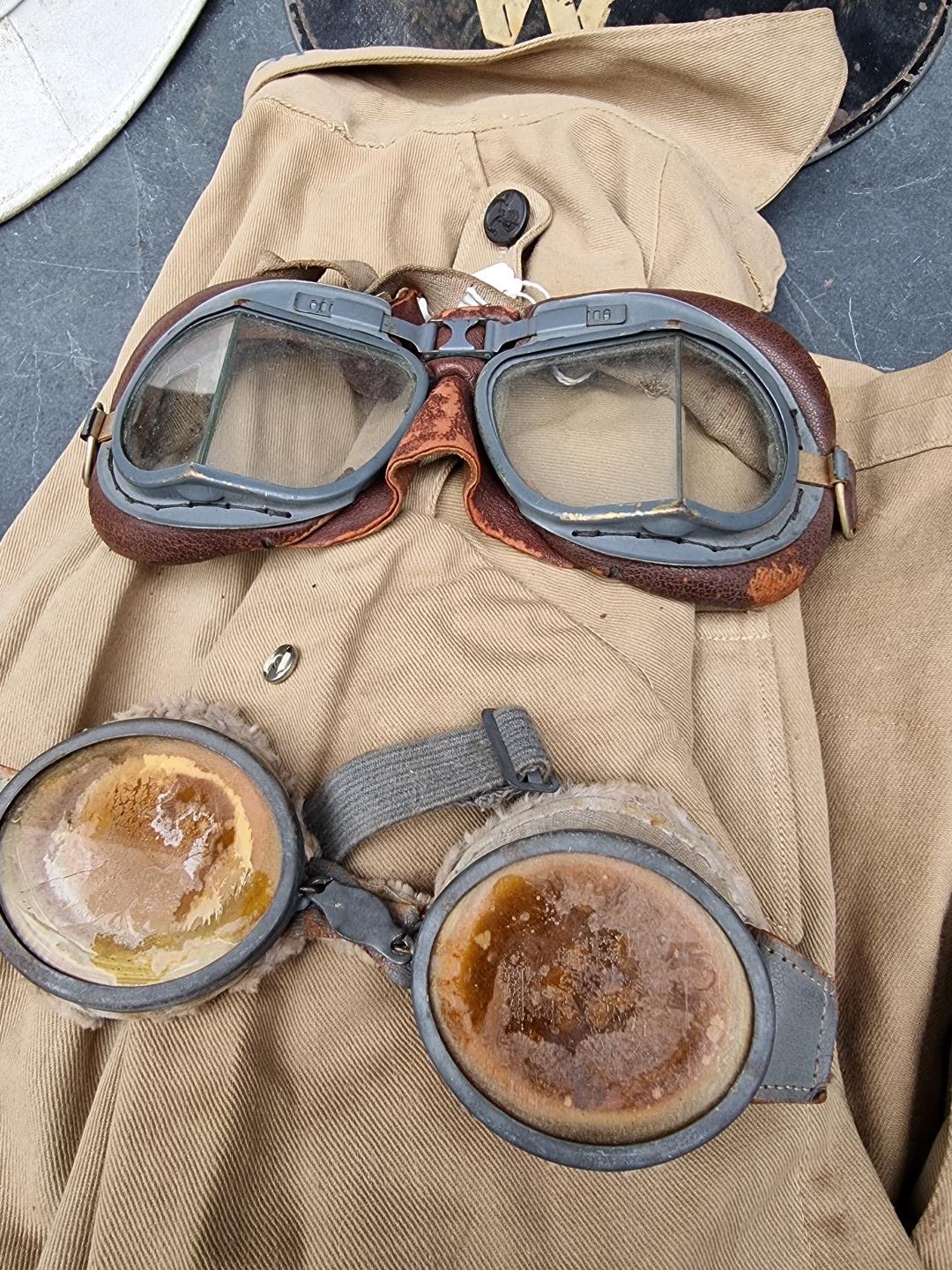 A group of militaria; comprising a British gas mask, dated 1943; an RAF officer's peaked cap; an ARP - Image 2 of 7