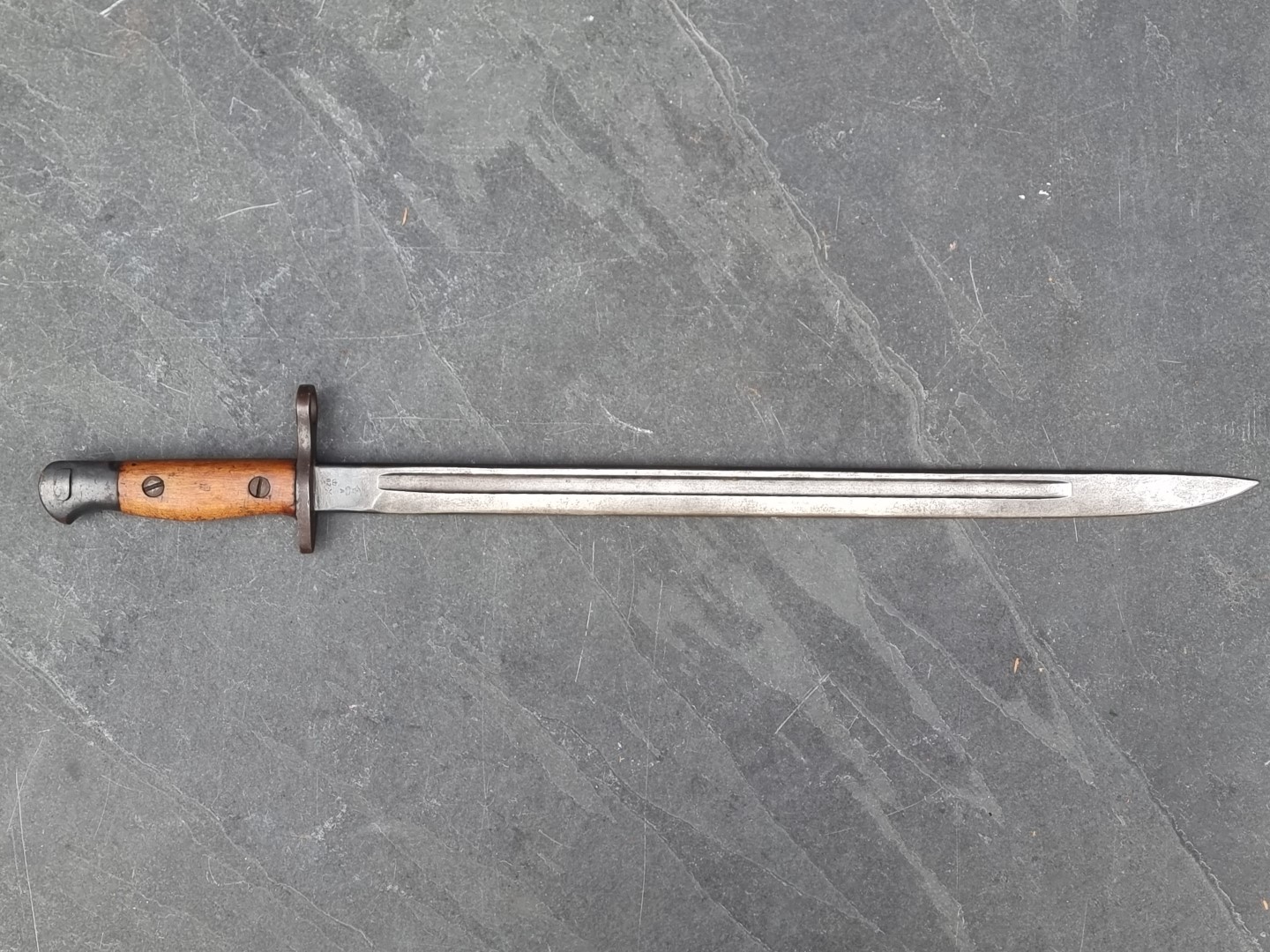 A WWI 1913 pattern Remington bayonet, the 43cm blade stamped '11-16'.