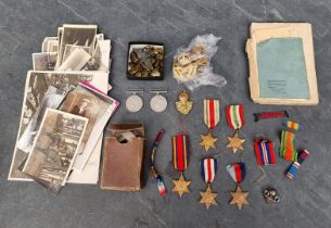 An interesting group of British Army and Navy related militaria, to include: postcards, photographs,