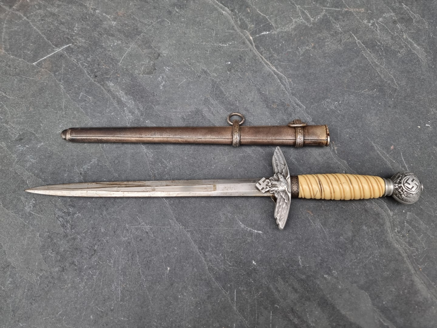 A German Third Reich Luftwaffe Officer's 2nd pattern dagger and sheath, with 25cm blade.