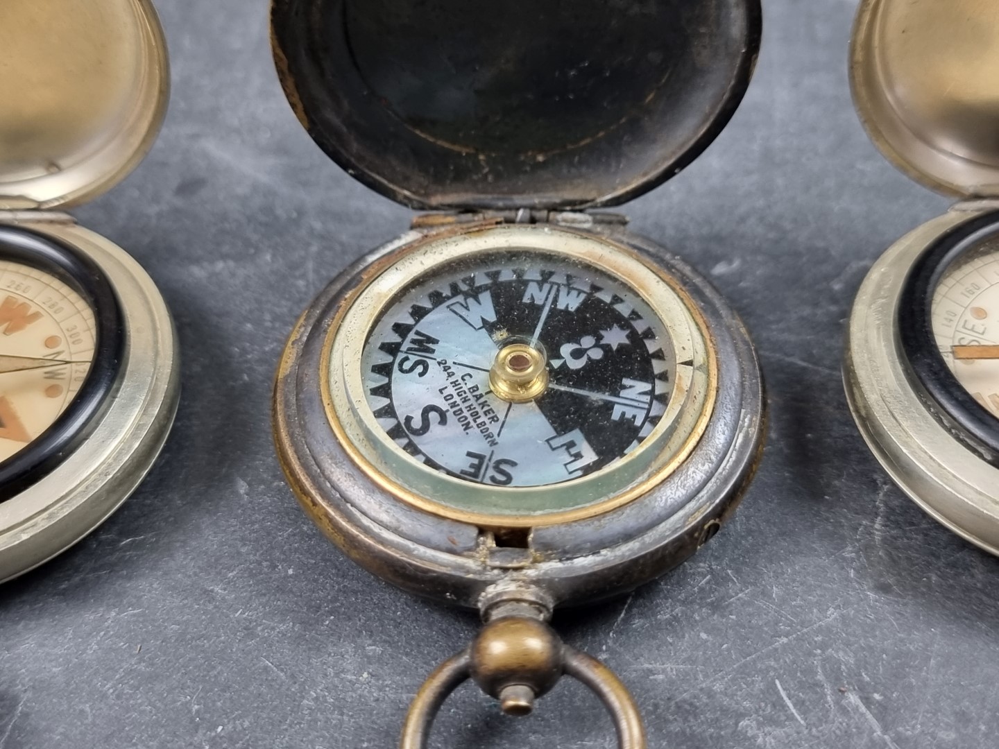 Two WWI military style nickel plated compasses; together with two other pocket compasses. (4) - Image 4 of 5