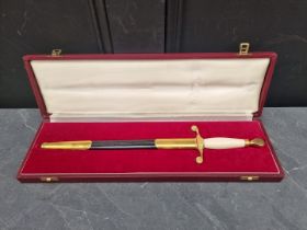 A cased Wilkinson Sword 1972 bicentennial presentation dagger and sheath, the 27.5cm blade etched,