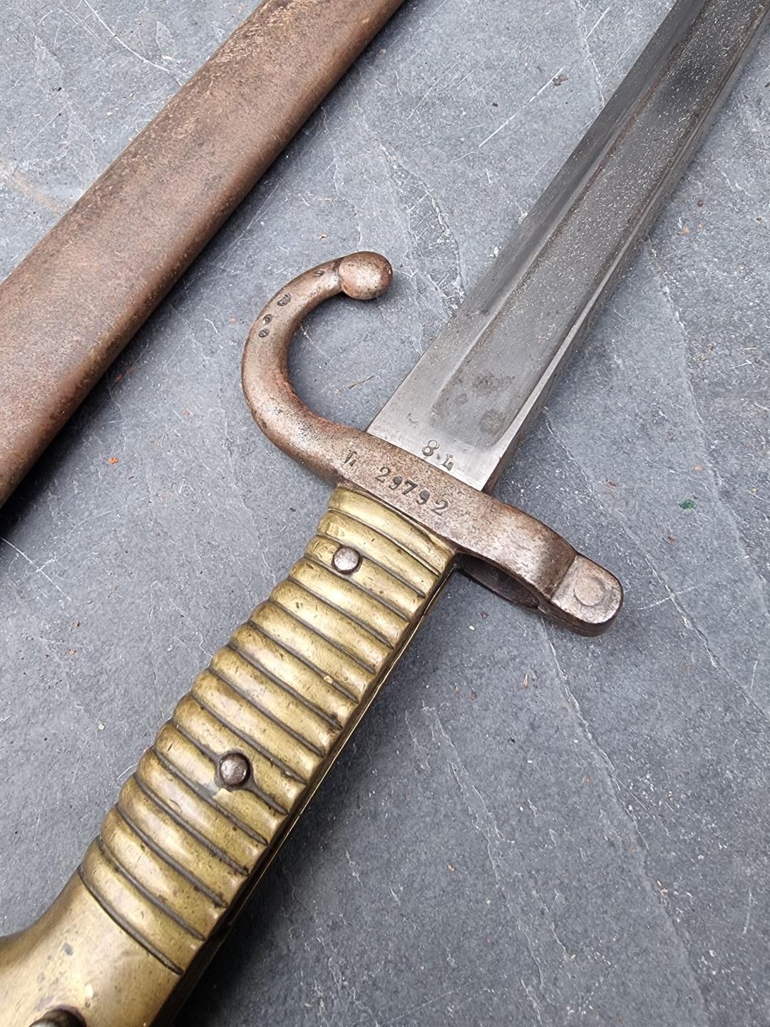 A French M1866 pattern chassepot sword bayonet and scabbard, the 57cm blade engraved 'St Etienne - Image 2 of 3