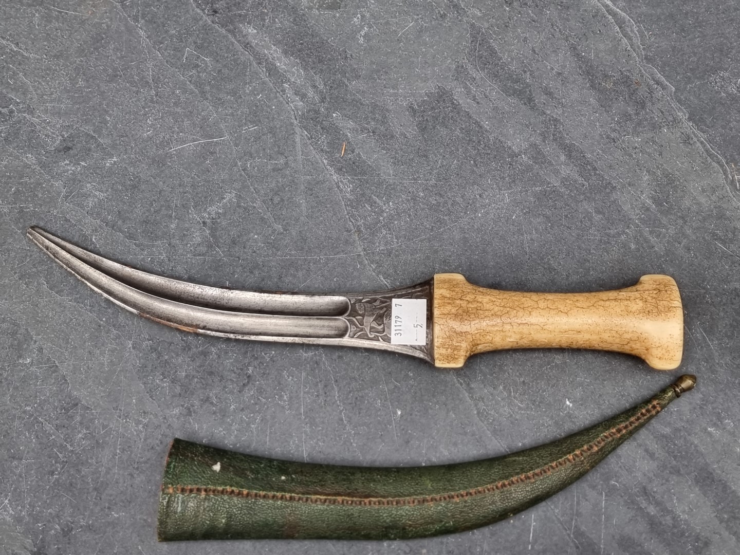 A Persian khanjar dagger and sheath, having curved 20cm blade, with bone hilt, the base of the blade - Image 6 of 9