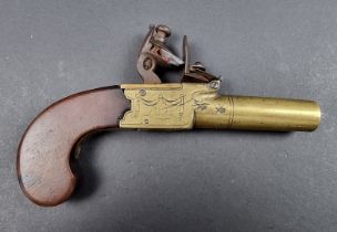 A 19th century brass flintlock pistol, by Richards of London, engraved box lock, twist off 1.5in