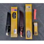 A Buck '120' Bowie knife and sheath, having 18.5cm, boxed; together with a Buck 'BU119 75th