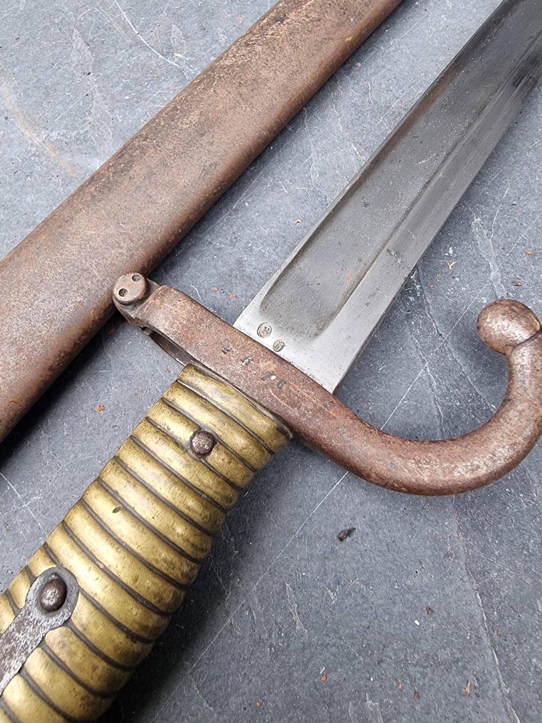 A French M1866 pattern chassepot sword bayonet and scabbard, the 57cm blade engraved 'St Etienne - Image 3 of 3